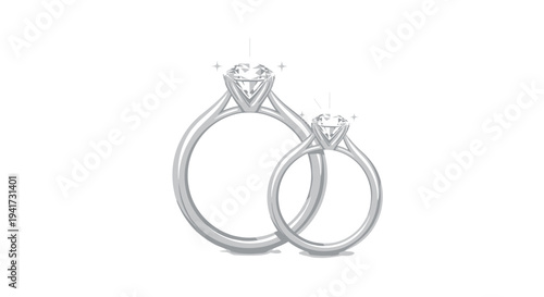 Two elegant silver engagement rings, each featuring a brilliant-cut diamond, are presented side-by-side on a white background.