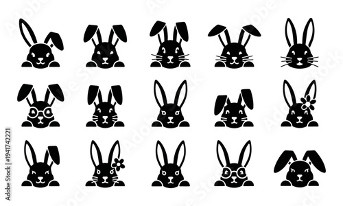 Set of cute black rabbit head silhouettes on white background