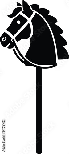 Silhouette of classic children’s toy hobby horse head on stick with bridle and mane, vintage nostalgic plaything symbol for childhood imagination and creative fun