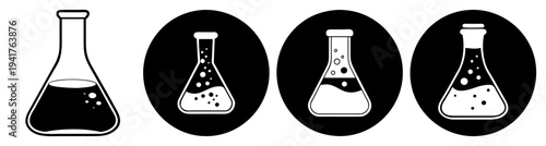 Laboratory glass flasks with colored liquids science experiment chemistry research isolated on black background