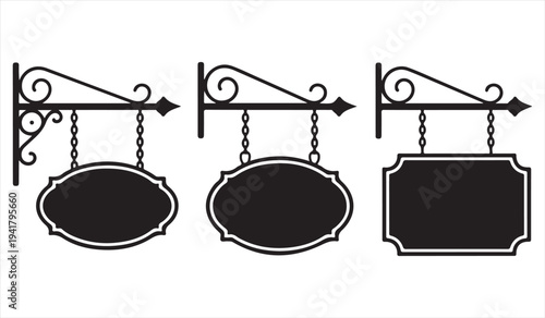 Vintage hanging shop sign silhouettes with decorative wrought iron brackets