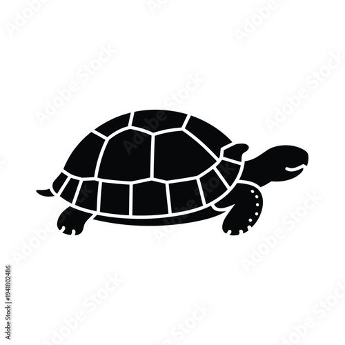A simple black silhouette depicts a turtle walking to the right