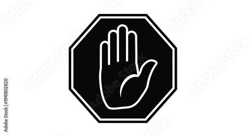 A black octagonal sign with a white hand stop gesture silhouette