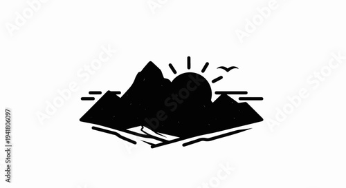 Silhouette of mountains at sunrise with bird flying overhead