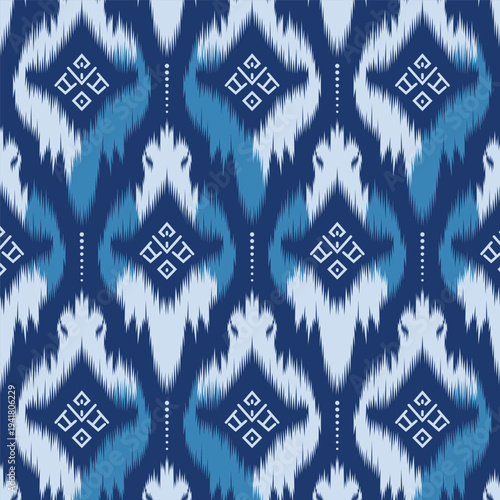 Ikat floral paisley embroidery seamless pattern on background. Ikat ethnic flower oriental pattern traditional. style abstract vector illustration. design for camo ikat floral fashion fabric,clothing