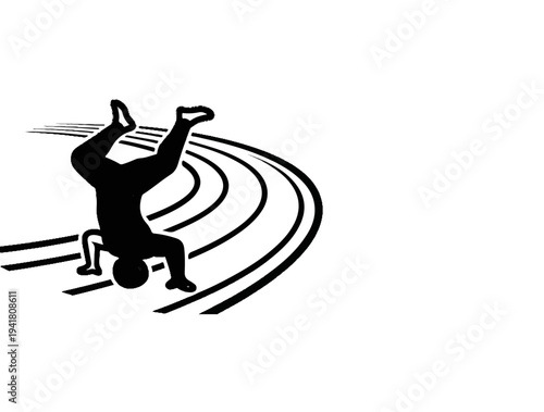 Silhouette of a person doing a handstand on a track