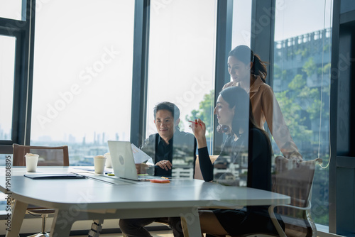 Collaboration meeting among professionals modern office business discussion urban environment close-up view teamwork dynamics