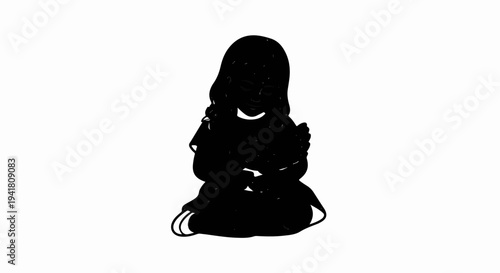 Silhouette of a child sitting, holding a toy