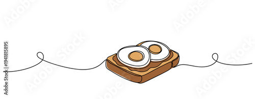 Toast with fried eggs resting on minimalist white surface