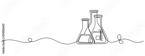 Laboratory glassware arranged on continuous line backdrop