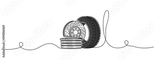 Stack of brake discs with tire leaning on line surface