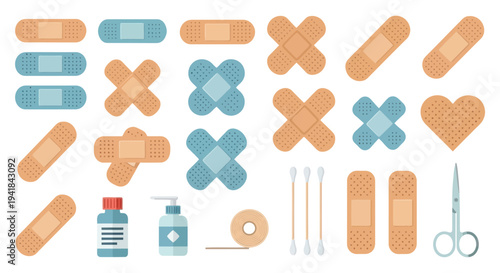 Assortment of adhesive bandages medical tape scissors and first aid supplies.