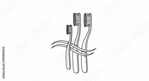 Three toothbrushes of varying sizes arranged artistically