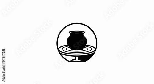 Stylized black pot on pottery wheel within a circle