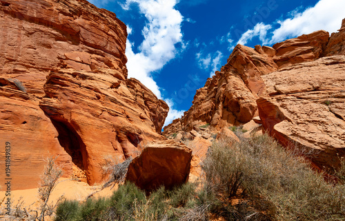 The Antelope Canyon in Arizona, USA, is a natural wonder, a magical place, and a tourist attraction created by the power of erosion. Before entering the narrow, cave-like slot canyon, the gorge opens 