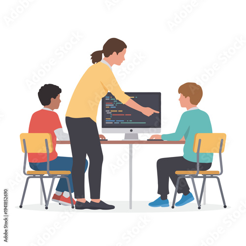 A teacher standing in front of a computer with two students sitting at a desk in a classroom setting