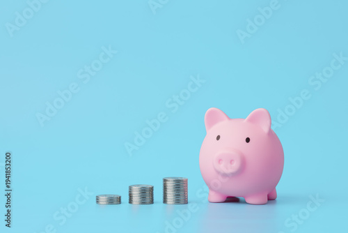 Savings goal planning with piggy bank and coin stacks