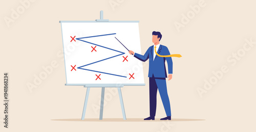 Businessman pointing at a graph on a whiteboard with a blue suit