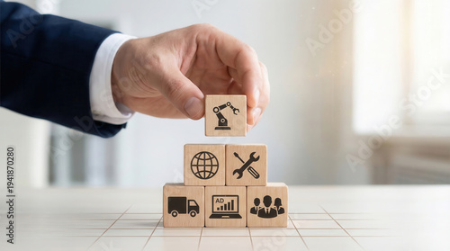Conceptualization of business growth and development, symbolized by building blocks representing industry, technology, and teamwork