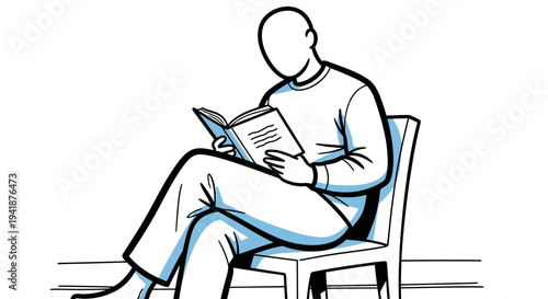 A man sitting on a chair reading a book