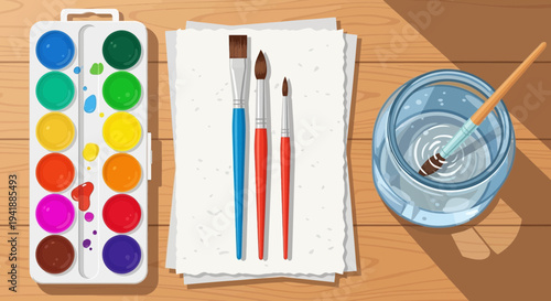 Art Supplies on Wooden Table with Watercolors, Brushes, and Paper