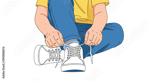 A child in a yellow shirt and blue jeans sits cross-legged, tying the white laces of a white sneaker on a white surface.