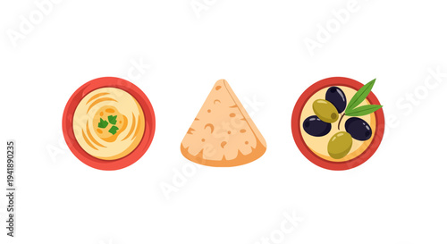 Delicious mediterranean snacks featuring hummus, feta cheese, and olives