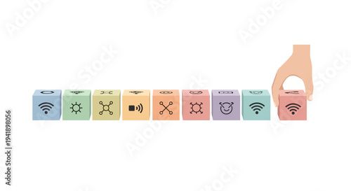 Hand selecting cube with wireless icon from a row of technology symbols