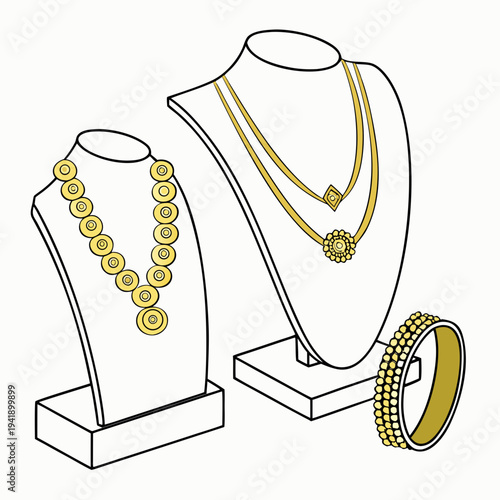 Gold jewelry display with necklaces and ring on stands