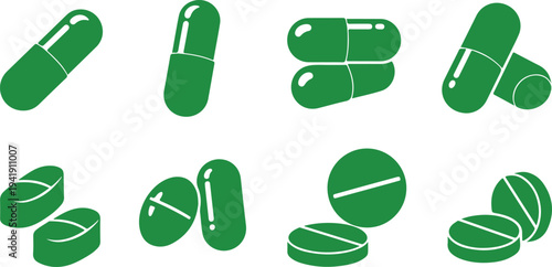 Collection of various green pill and capsule shapes isolated on transparent background for medical or pharmaceutical use