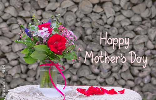 Mother's Day Bouquet of colorful flowers isolated on gray background.