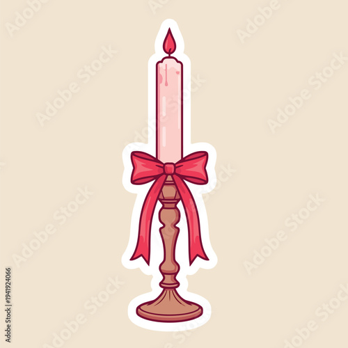 A decorative pink candle with a red ribbon and ornate stand isolated on a beige background