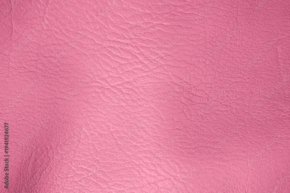 Fototapeta premium Elegant soft pink textured faux leather material surface showing detailed fine wrinkles and patterns