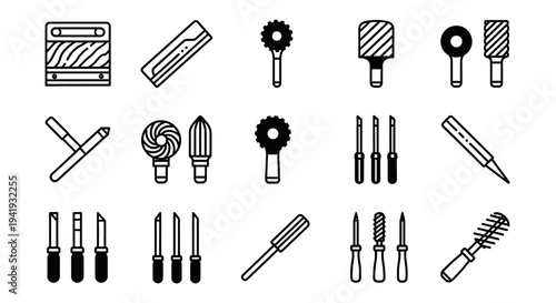 Collection of various industrial drill bits and tools on a plain background from a straightforward viewpoint