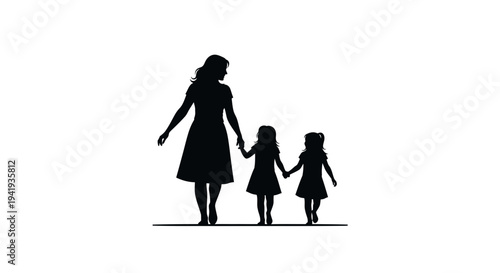 Silhouette of a mother holding hands with two daughters walking together.