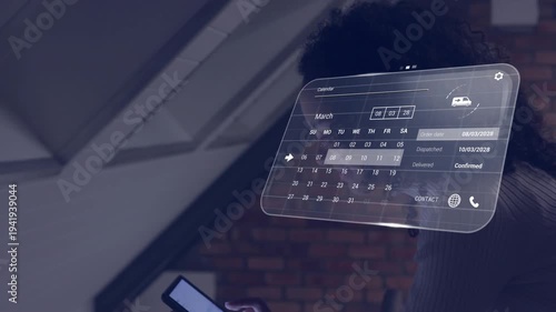 Woman tapping tablet, holographic calendar highlighting date and updating order status to confirmed