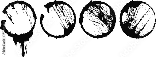 Black coffee cup stains in various shapes and patterns on white background