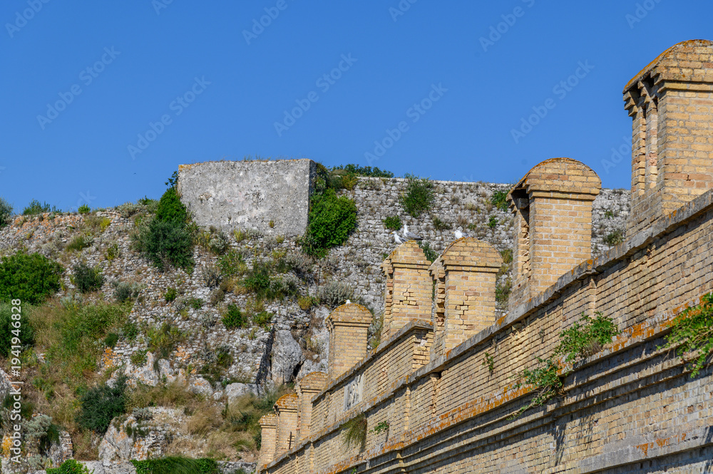 Naklejka premium Historic stone wall section of Corfu Old Fortress, Greece 