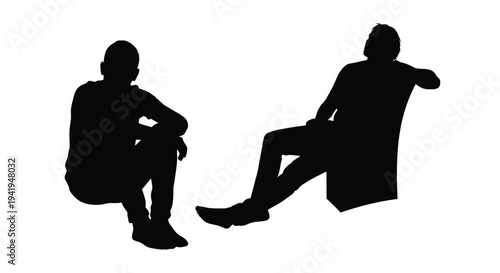 Two men sitting and squatting in a stark black silhouette