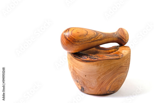 Foto Mortar and pestle against a white background