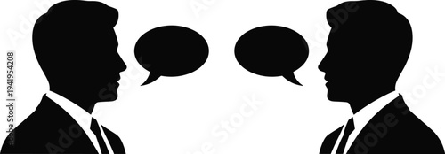 Silhouette of two businessmen in profile facing each other with empty speech bubbles above their heads symbolizing communication and dialogue
