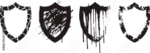 Grunge shield vector set with distressed texture and paint splatter overlays for design and protection symbols