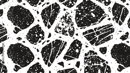 black and white terrazzo floor pattern with irregular stone fragments and splatter texture