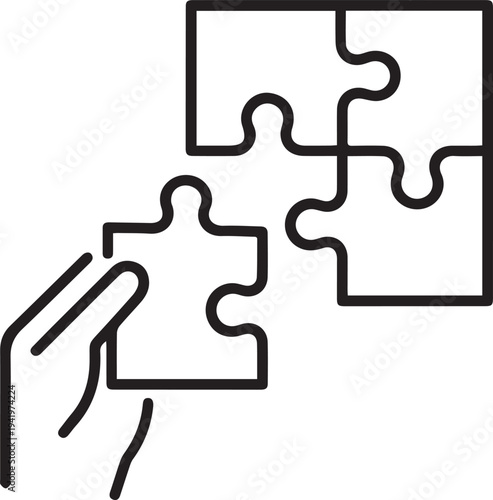 Hand Placing Final Puzzle Piece