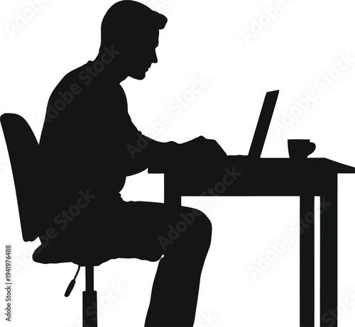 Silhouette of a man working on a laptop at a desk with a coffee cup.