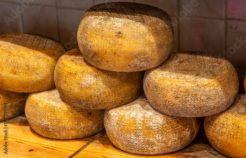 Process of making  parmesan hard cheese.