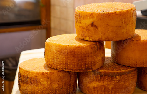 Process of making  parmesan hard cheese.