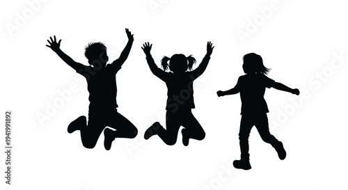 Three joyful children leaping in the air a striking silhouette