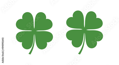Two vibrant green four leaf clovers depicted as a flat silhouette