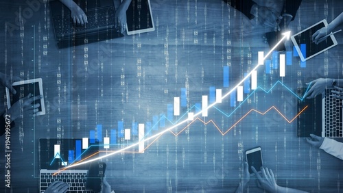 Bild auf Leinwand Group of professionals engaged in financial analysis using laptops and tablets, accompanied by stock market trends, showcasing business growth and technological advancement